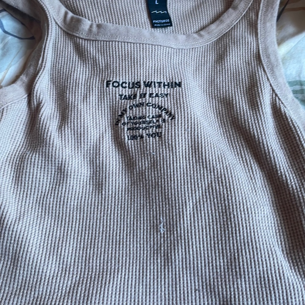 Factorie size L. Light brown top. Good thing to wear for a casual outfit